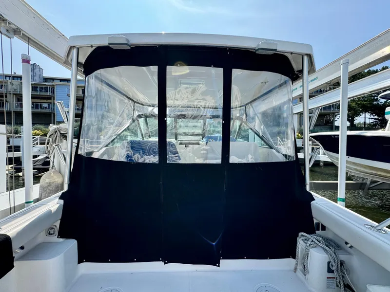 Slide: The Image of 2006 Tiara Yachts 29 Open with covered cockpit at marina. - 3