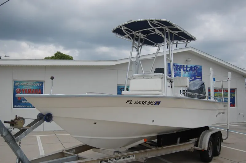 The Image of 2004 Cape Horn Cape Bay boat on trailer, parked outside dealership. - 0