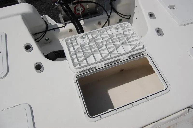 Slide: The Image of Open storage compartment on 2004 Cape Horn Cape Bay boat deck. - 23