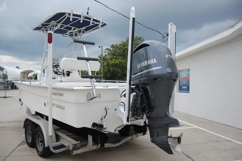 Slide: The Image of 2004 Cape Horn Cape Bay boat with Yamaha outboard motor on trailer. - 5
