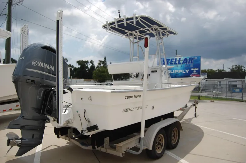 Slide: The Image of 2004 Cape Horn Cape Bay boat on trailer with Yamaha outboard motor. - 7