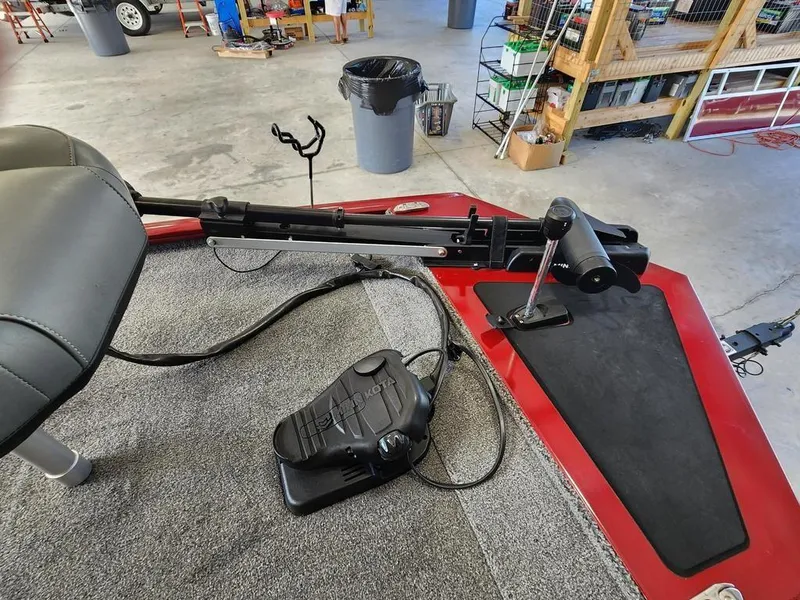 Slide: The Image of 2021 Tracker Pro 170 boat interior with trolling motor and foot pedal. - 5