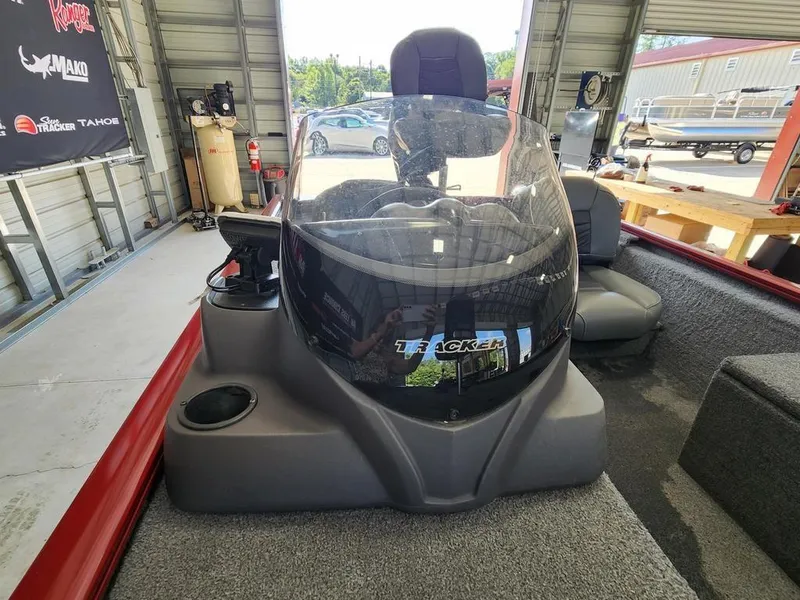 Slide: The Image of 2021 Tracker Pro 170 boat interior in a garage setting. - 6
