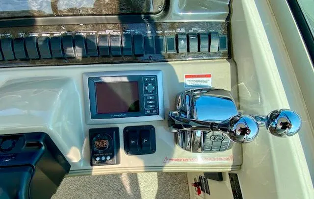 Slide: The Image of Control panel of 2008 Sea Ray 440 Sundancer boat with navigation equipment. - 11