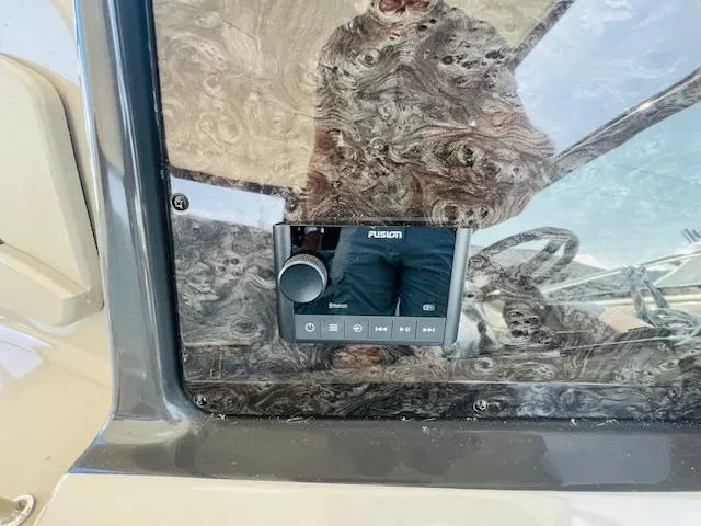 Slide: The Image of Fusion stereo system on 2008 Sea Ray 440 Sundancer boat dashboard. - 15