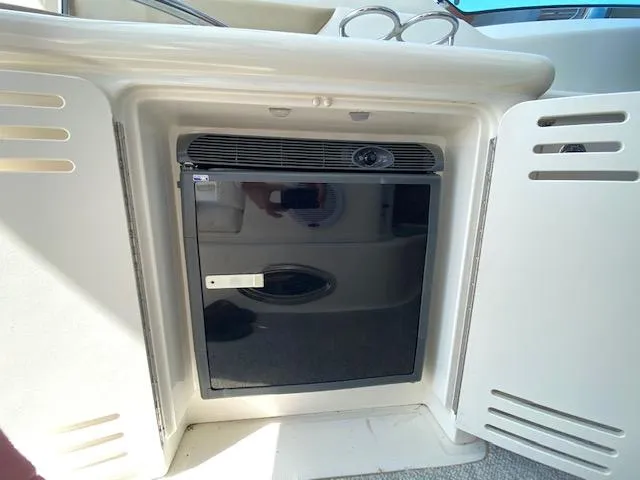 Slide: The Image of Mini fridge in 2008 Sea Ray 440 Sundancer yacht interior. - 16