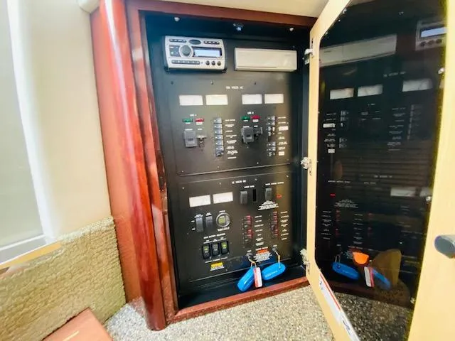 Slide: The Image of Electrical control panel inside 2008 Sea Ray 440 Sundancer yacht. - 20
