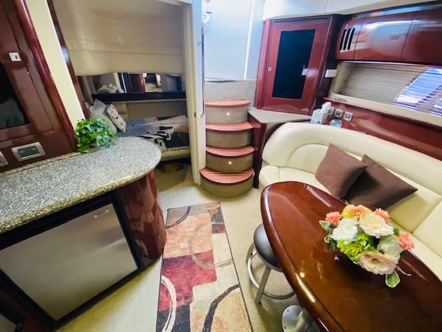 Slide: The Image of Luxurious 2008 Sea Ray 440 Sundancer interior with elegant seating and modern amenities. - 22