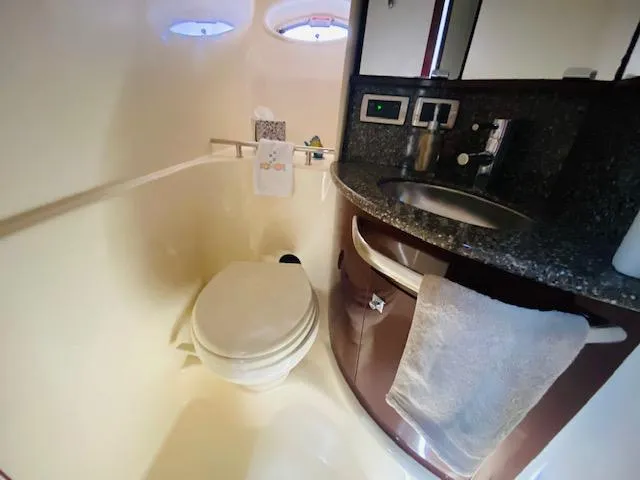 Slide: The Image of Luxurious bathroom in 2008 Sea Ray 440 Sundancer yacht with modern amenities. - 28