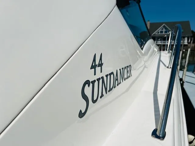 Slide: The Image of Close-up of 2008 Sea Ray 440 Sundancer yacht with sleek design and railing. - 8