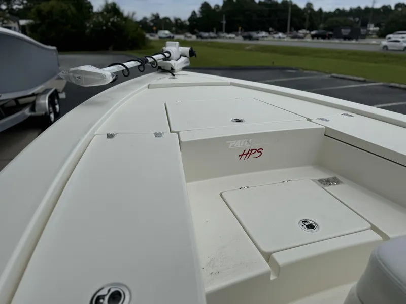 Slide: The Image of 2025 Pathfinder 2300 HPS boat deck, white finish, outdoor display. - 13