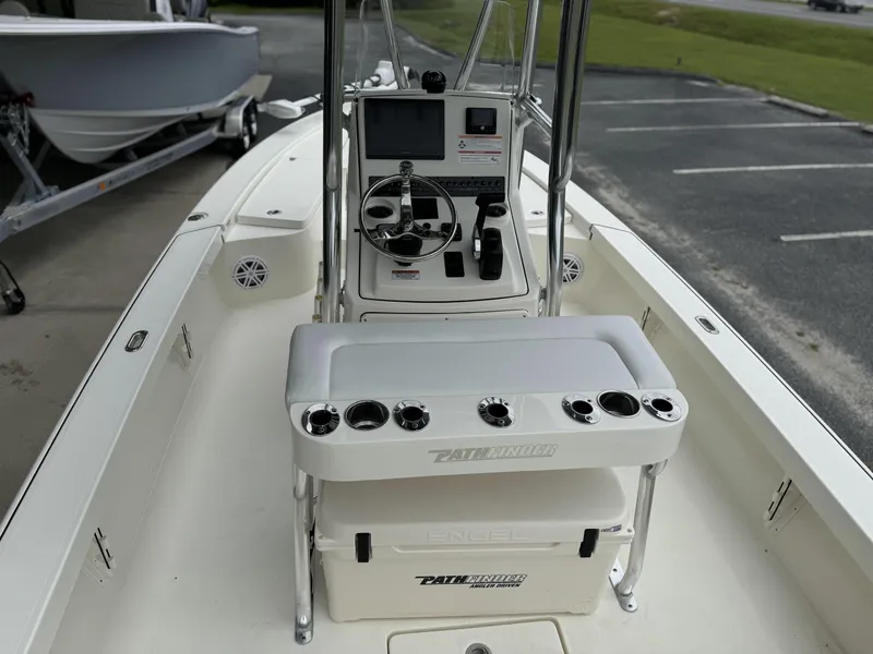 Slide: The Image of 2025 Pathfinder 2300 HPS boat interior with console and seating. - 15