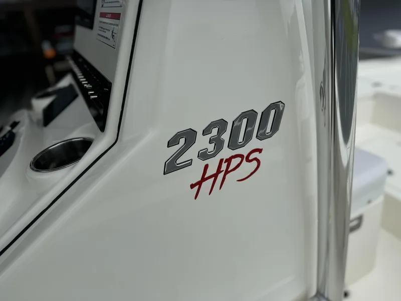 Slide: The Image of 2025 Pathfinder 2300 HPS boat console with model branding. - 18
