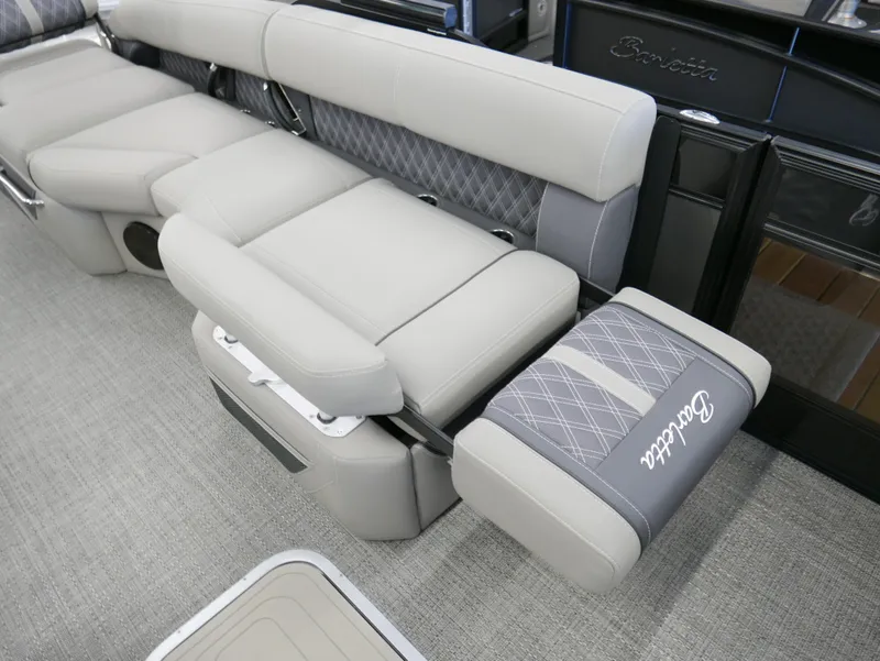 Slide: The Image of 2024 Barletta Lusso 23M luxury seating with elegant gray upholstery and diamond stitching. - 22