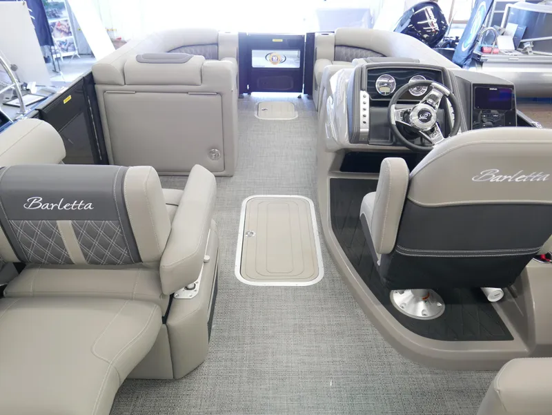 Slide: The Image of 2024 Barletta Lusso 23M interior with luxurious seating and modern dashboard. - 31