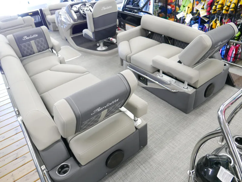 Slide: The Image of 2024 Barletta Lusso 23M pontoon boat interior with luxurious seating and modern design. - 37