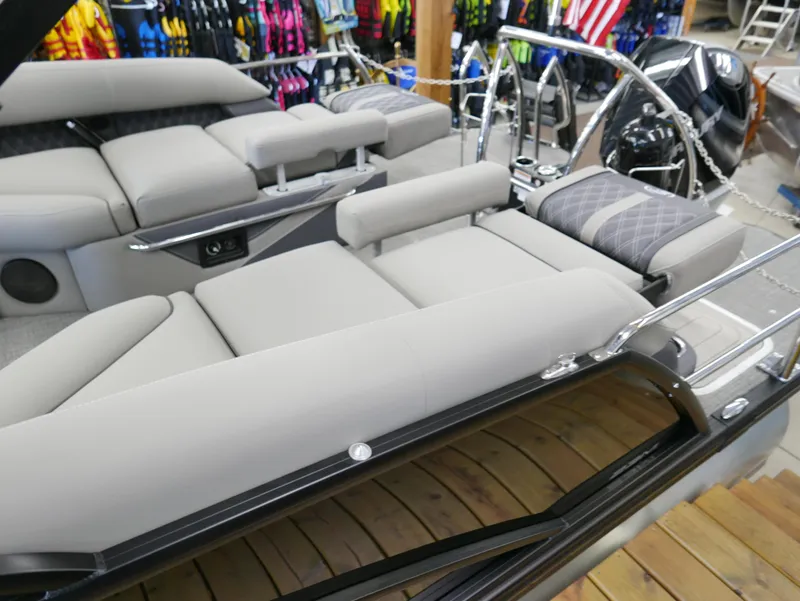 Slide: The Image of 2024 Barletta Lusso 23M luxury pontoon boat interior with plush seating and modern design. - 41