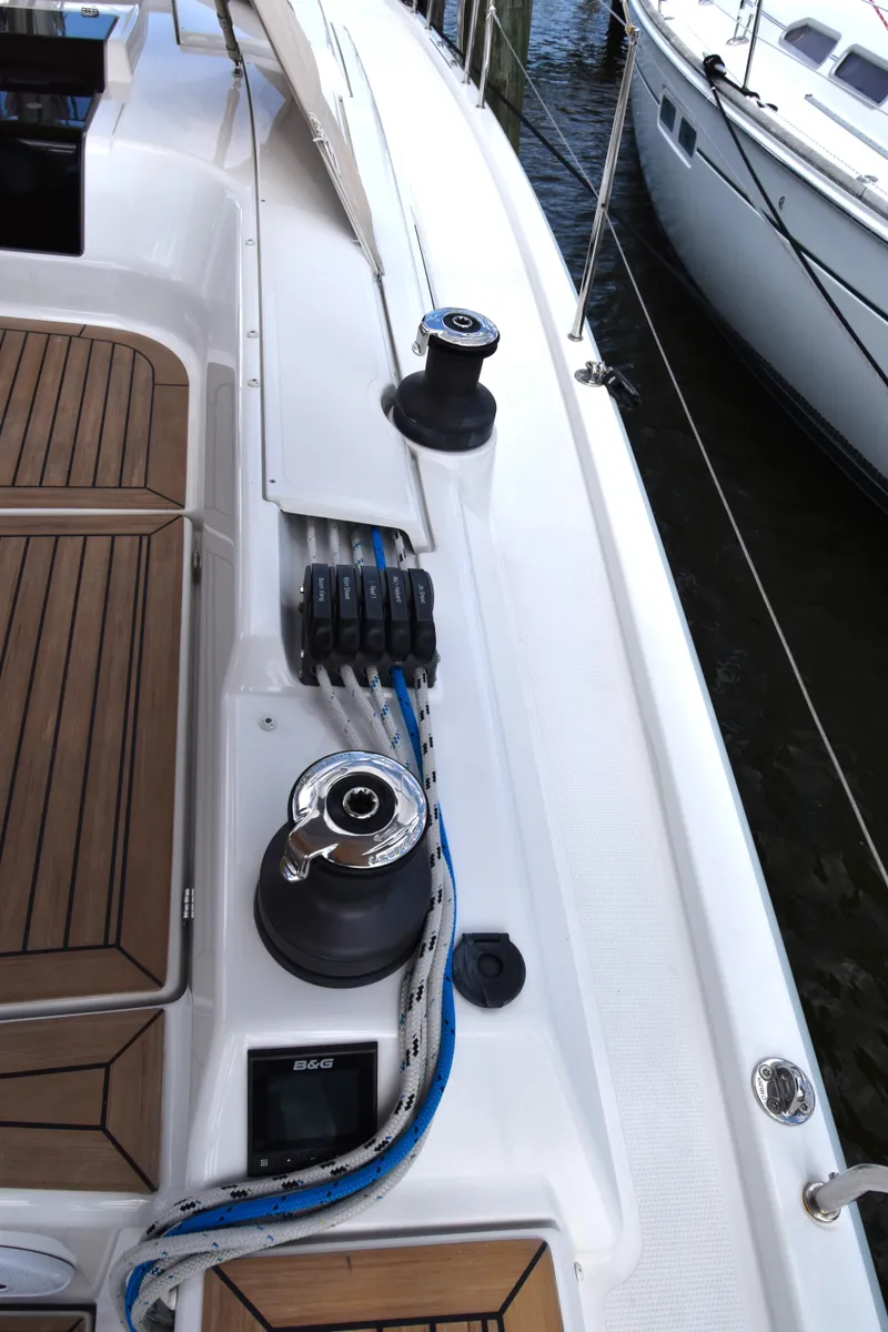 Slide: The Image of 2019 Hanse 458 yacht deck with winches and ropes. - 21