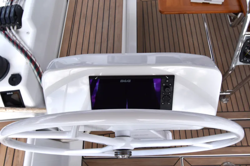 Slide: The Image of Steering wheel and navigation system on 2019 Hanse 458 yacht. - 25