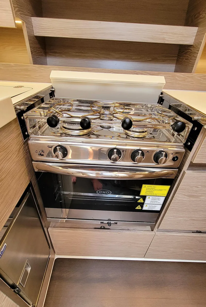 Slide: The Image of Modern kitchen stove in 2019 Hanse 458 yacht interior. - 38