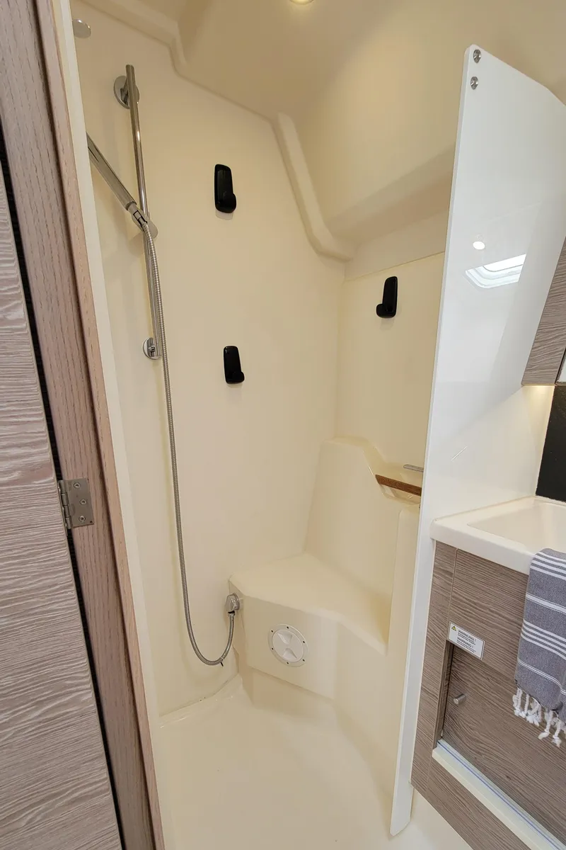 Slide: The Image of Modern shower area in 2019 Hanse 458 yacht, featuring sleek design and fixtures. - 47