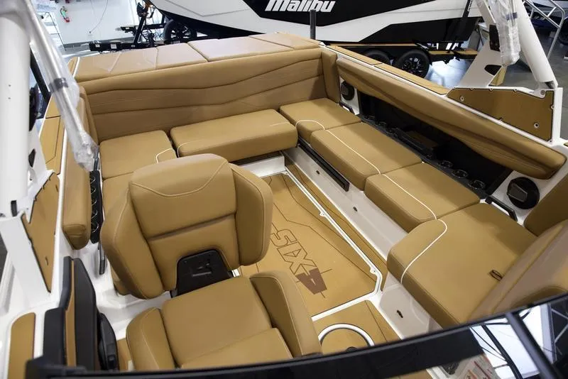 Slide: The Image of Luxurious interior of 2025 Axis A225 boat with tan leather seating. - 19