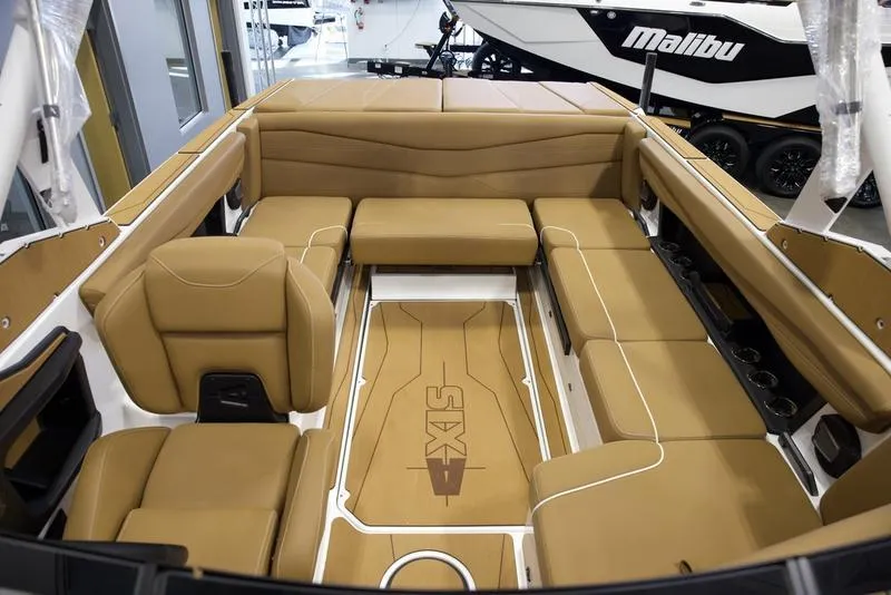 Slide: The Image of Luxurious interior of 2025 Axis A225 boat with tan leather seating. - 21
