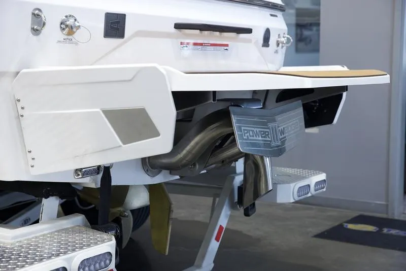 Slide: The Image of 2025 Axis A225 boat rear view with Power Wedge and swim platform. - 5