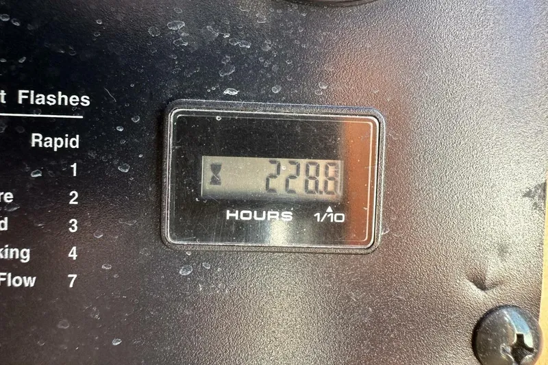 Slide: The Image of Hour meter reading 228.8 on 2003 Sabre 36 Fly Bridge Sedan dashboard. - 16