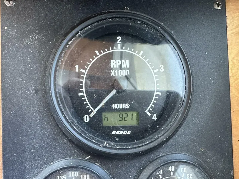 Slide: The Image of RPM gauge showing 921 hours on a 2003 Sabre 36 Fly Bridge Sedan. - 19