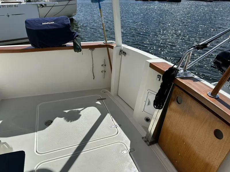 Slide: The Image of 2003 Sabre 36 Fly Bridge Sedan boat deck with water view. - 35