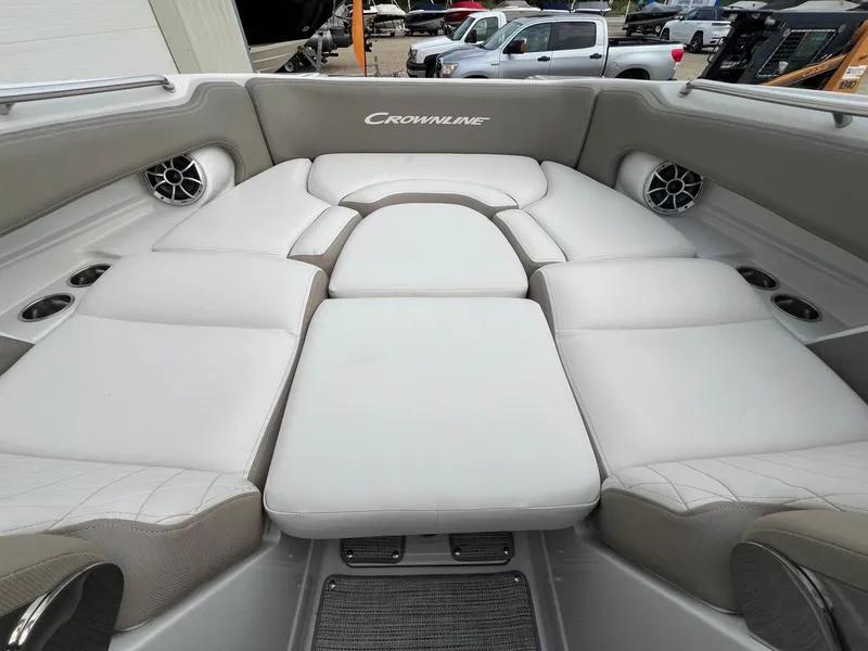 Slide: The Image of 2019 Crownline Eclipse E285 boat interior with spacious cushioned seating. - 15