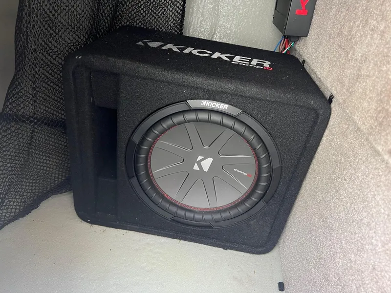 Slide: The Image of Kicker subwoofer installed in a 2019 Crownline Eclipse E285 boat. - 16