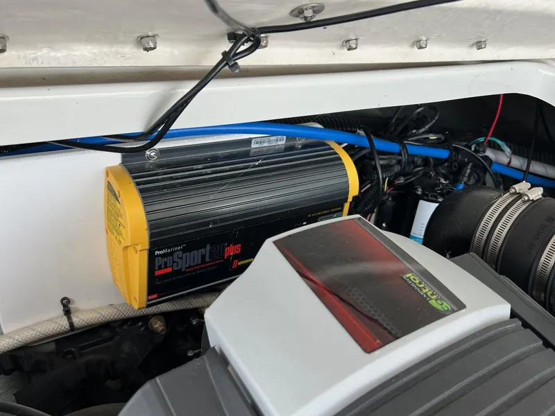 Slide: The Image of 2019 Crownline Eclipse E285 engine compartment with ProMariner ProSport20 Plus charger. - 41