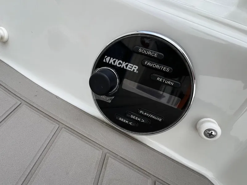 Slide: The Image of Kicker audio control panel on 2019 Crownline Eclipse E285 boat. - 46