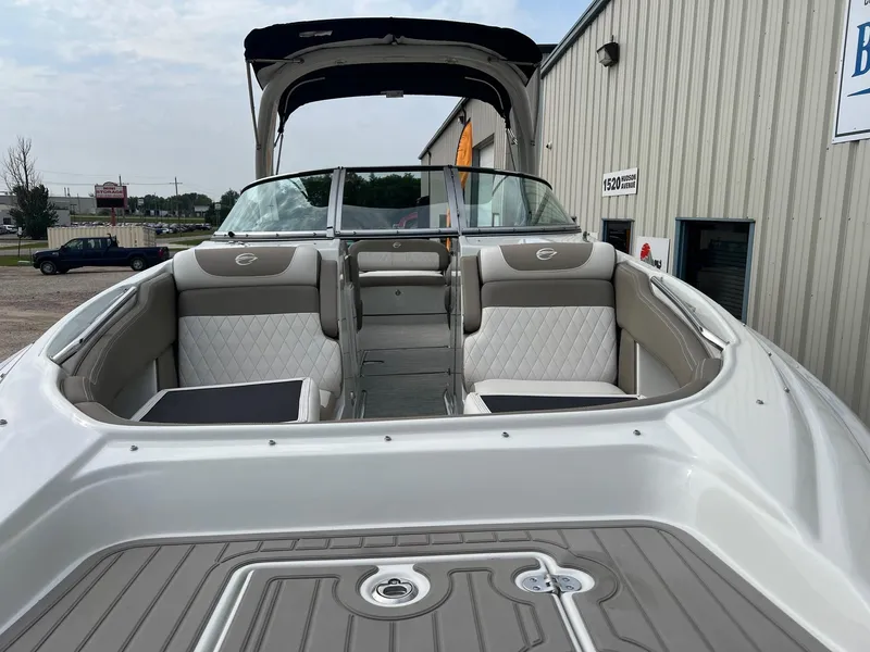 Slide: The Image of 2019 Crownline Eclipse E285 boat with spacious seating and sleek design. - 5