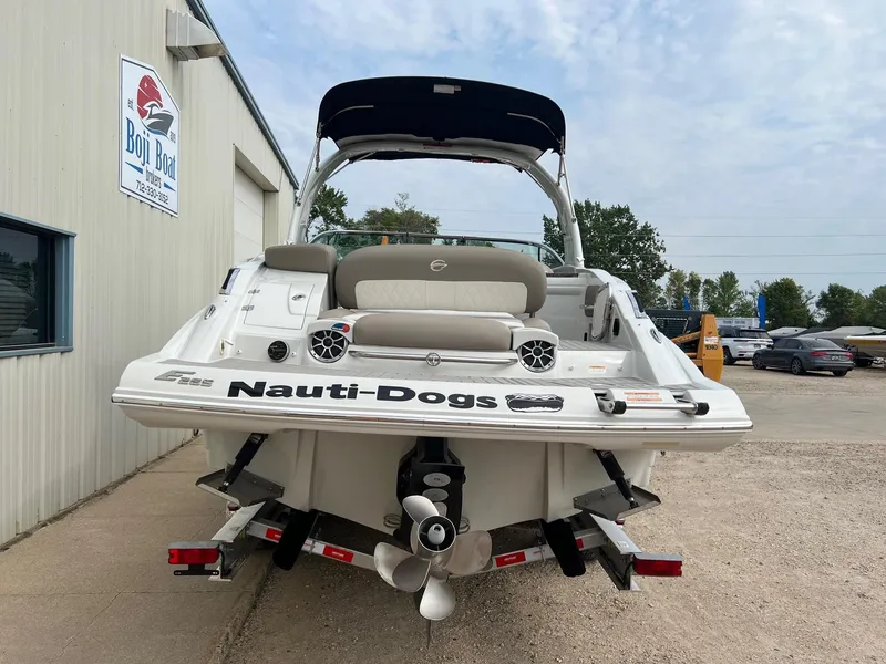 Slide: The Image of 2019 Crownline Eclipse E285 boat at Boji Boat dealership, rear view. - 6