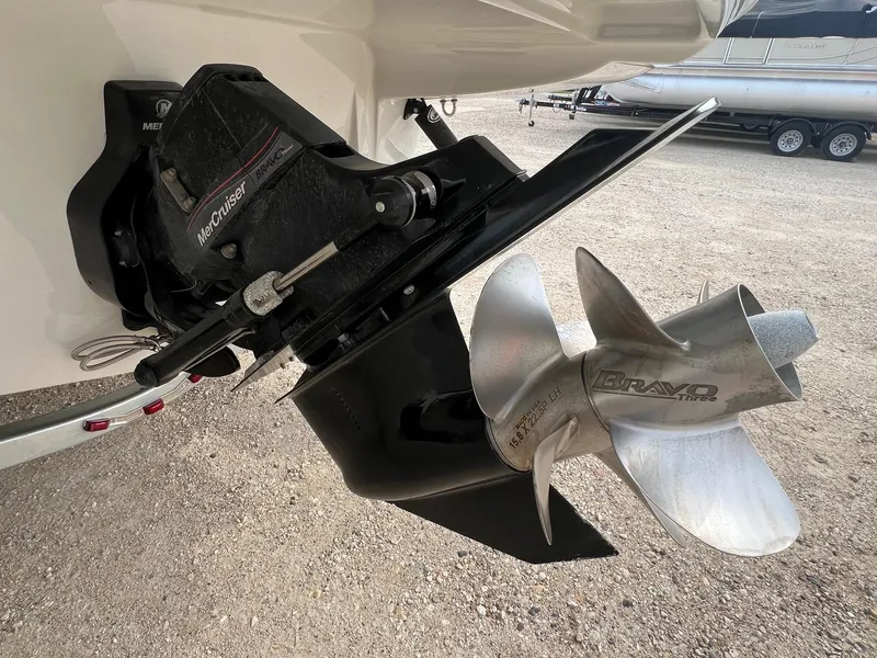 Slide: The Image of 2019 Crownline Eclipse E285 boat with MerCruiser Bravo Three outdrive and propeller. - 7