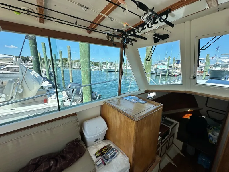 Slide: The Image of Interior view of 1998 Mast & Mallet Rabbit 34 boat docked at marina. - 15