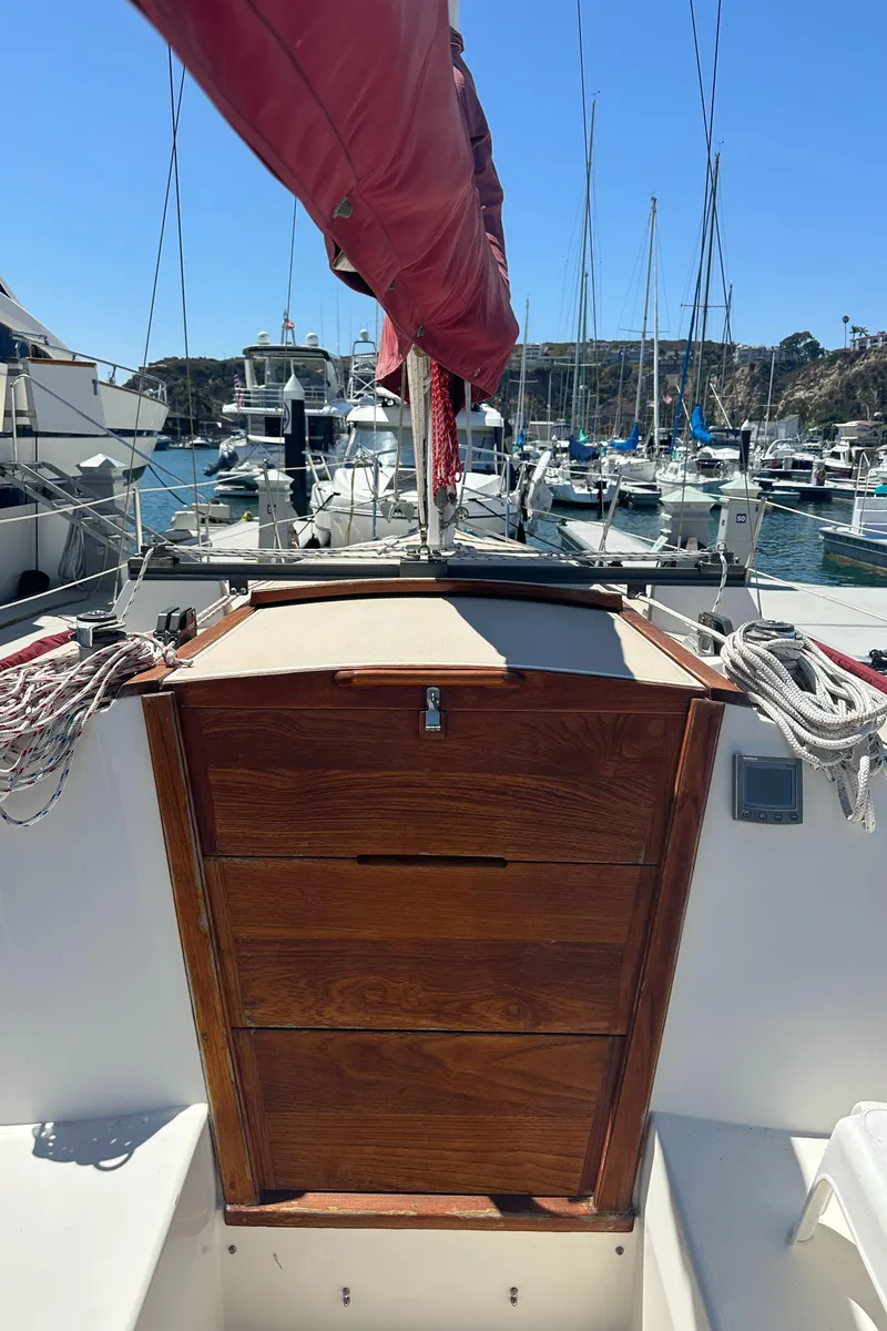 Slide: The Image of 1988 Catalina 30 sailboat cockpit with marina view. - 20