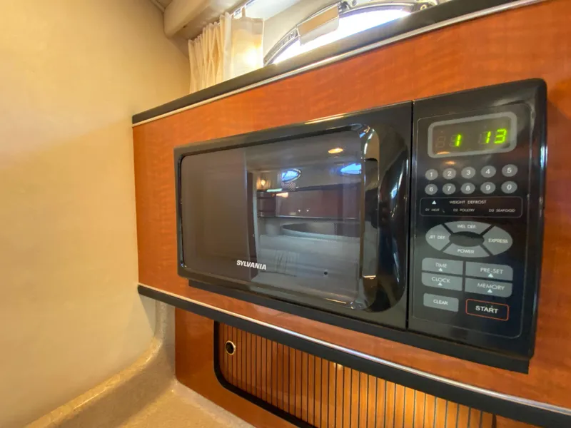 Slide: The Image of Microwave in 2003 Sea Ray SUNDANCER 300 yacht interior kitchen area. - 21