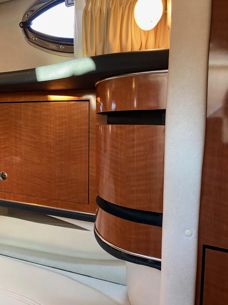 Slide: The Image of Interior cabin of 2003 Sea Ray SUNDANCER 300 with wooden cabinetry. - 33