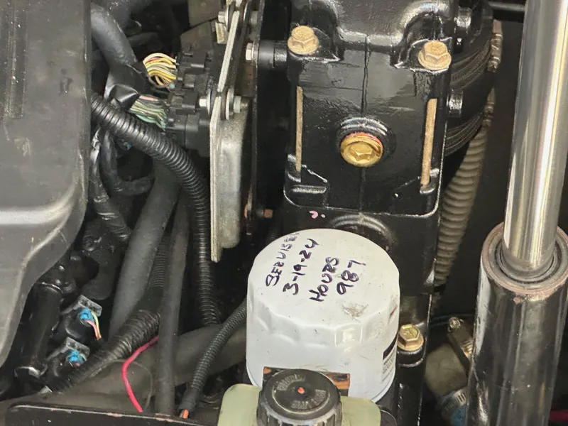 Slide: The Image of Engine compartment of a 2003 Sea Ray SUNDANCER 300 boat, showing mechanical components. - 38