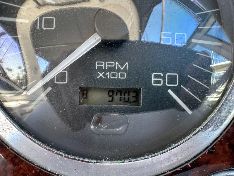 Slide: The Image of Close-up of 2003 Sea Ray SUNDANCER 300 RPM gauge showing 970.3 hours. - 41