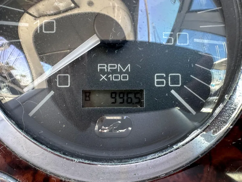 Slide: The Image of Close-up of 2003 Sea Ray SUNDANCER 300 RPM gauge showing 996.5 RPM. - 42