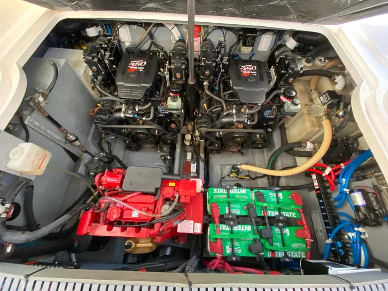 Slide: The Image of Engine compartment of 2003 Sea Ray SUNDANCER 300 with dual 250 horsepower engines. - 45