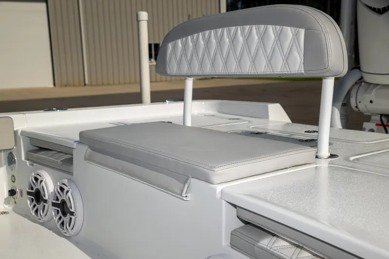 Slide: The Image of 2025 Contender 26 Bay boat seat with diamond-stitched upholstery and built-in speakers. - 12