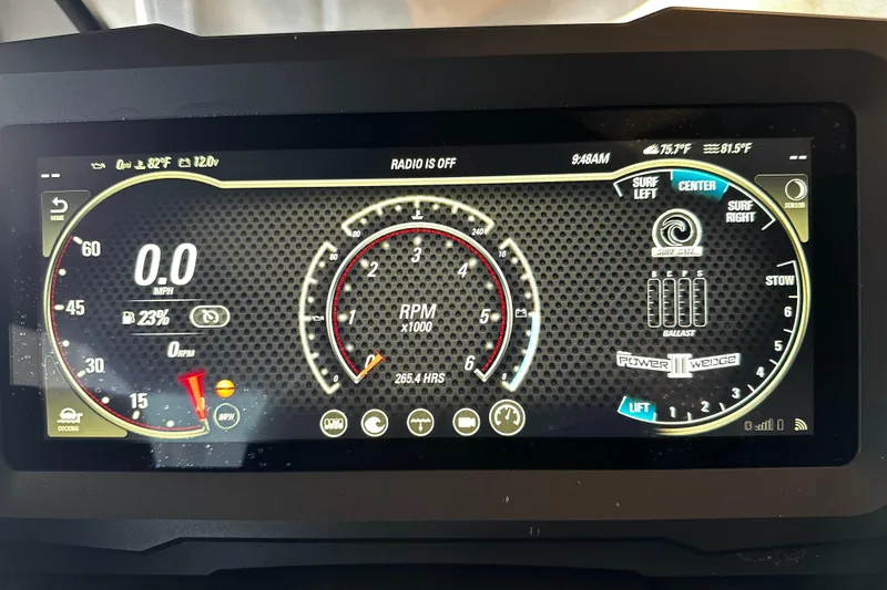 Slide: The Image of Dashboard of 2022 Malibu Wakesetter 20 VTX showing RPM and speed indicators. - 21