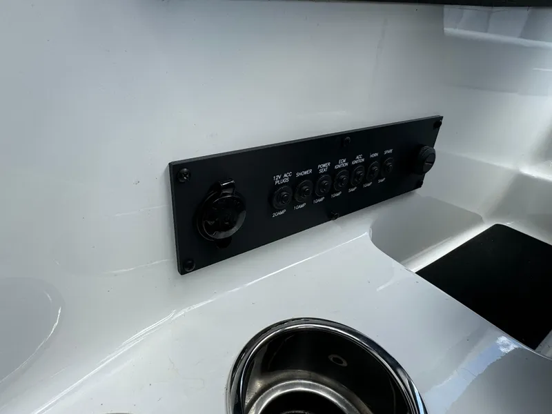 Slide: The Image of Control panel on 2022 Malibu Wakesetter 20 VTX boat interior. - 26