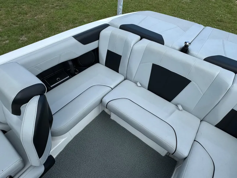 Slide: The Image of 2022 Malibu Wakesetter 20 VTX interior seating, featuring sleek gray and black upholstery. - 34